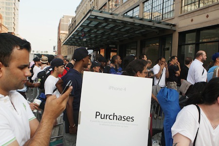 People await the sale of Apple iPhone 4