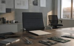 Salle de réunion avec fauteuil de dirigeant et outils d’ingénierie